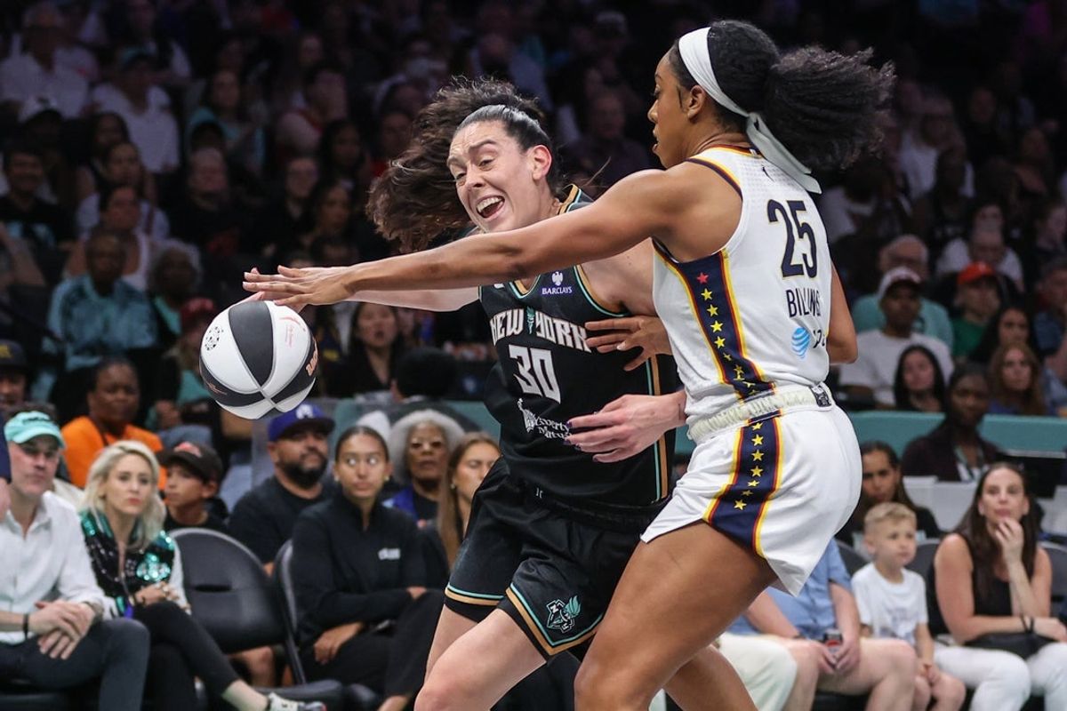 Jun 6, 2026; Brooklyn, New York, USA;  New York Liberty forward Breanna Stewart (30) looks to drive past Indiana Fever forward Monique Billings (25) in the first quarter at Barclays Center. Mandatory Credit: Wendell Cruz-Imagn Images
