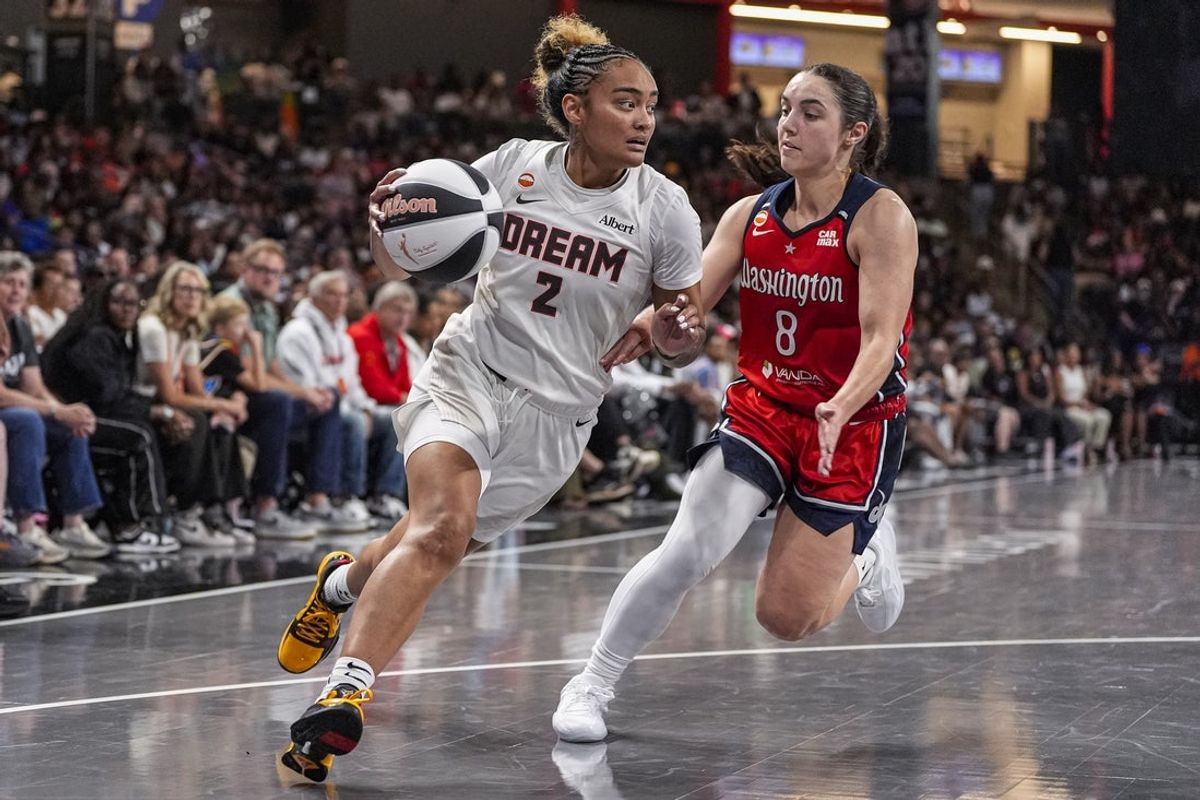Jun 6, 2026; College Park, Georgia, USA; Atlanta Dream guard Te-Hina Paopao (2) dribbles against Washington Mystics guard Georgia Amoore (8) at Gateway Center at College Park. Mandatory Credit: Dale Zanine-Imagn Images