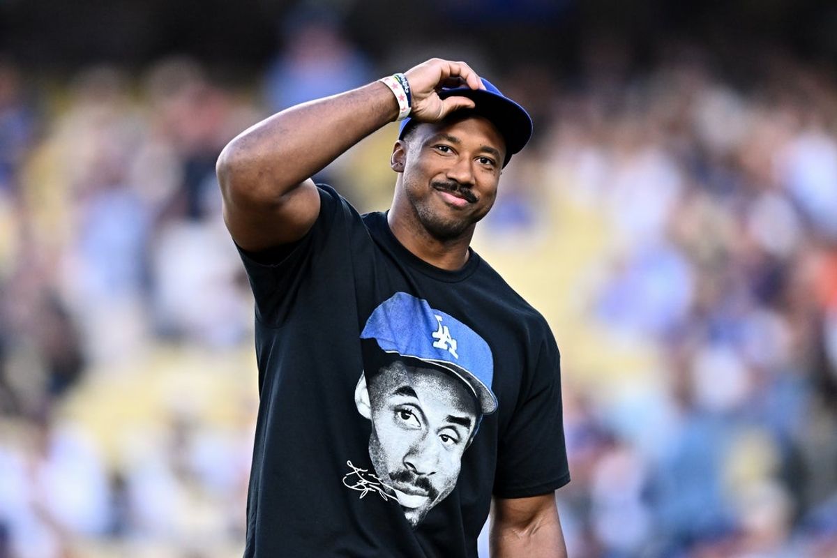 Jun 6, 2026; Los Angeles, California, USA; Los Angeles Rams defensive end Myles Garrett looks on prior to throwing out the honorary first pitch before a game between the Los Angeles Angels and Los Angeles Dodgers at Dodger Stadium. Mandatory Credit: William Liang-Imagn Images