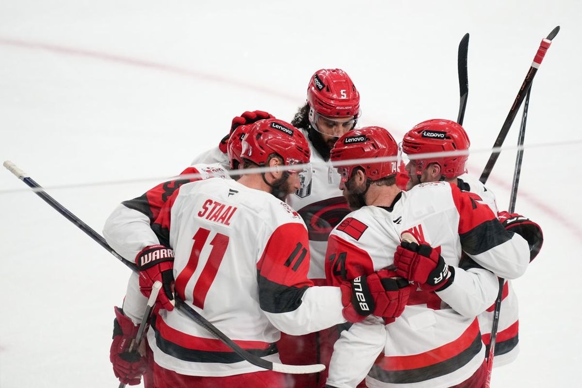 Jun 6, 2026; Las Vegas, Nevada, USA; Carolina Hurricanes center Jordan Staal (11) celebrates with teammates after scoring a goal against the Vegas Golden Knights during the third period in game three of the 2026 Stanley Cup Final at T-Mobile Arena. Mandatory Credit: Lucas Peltier-Imagn Images