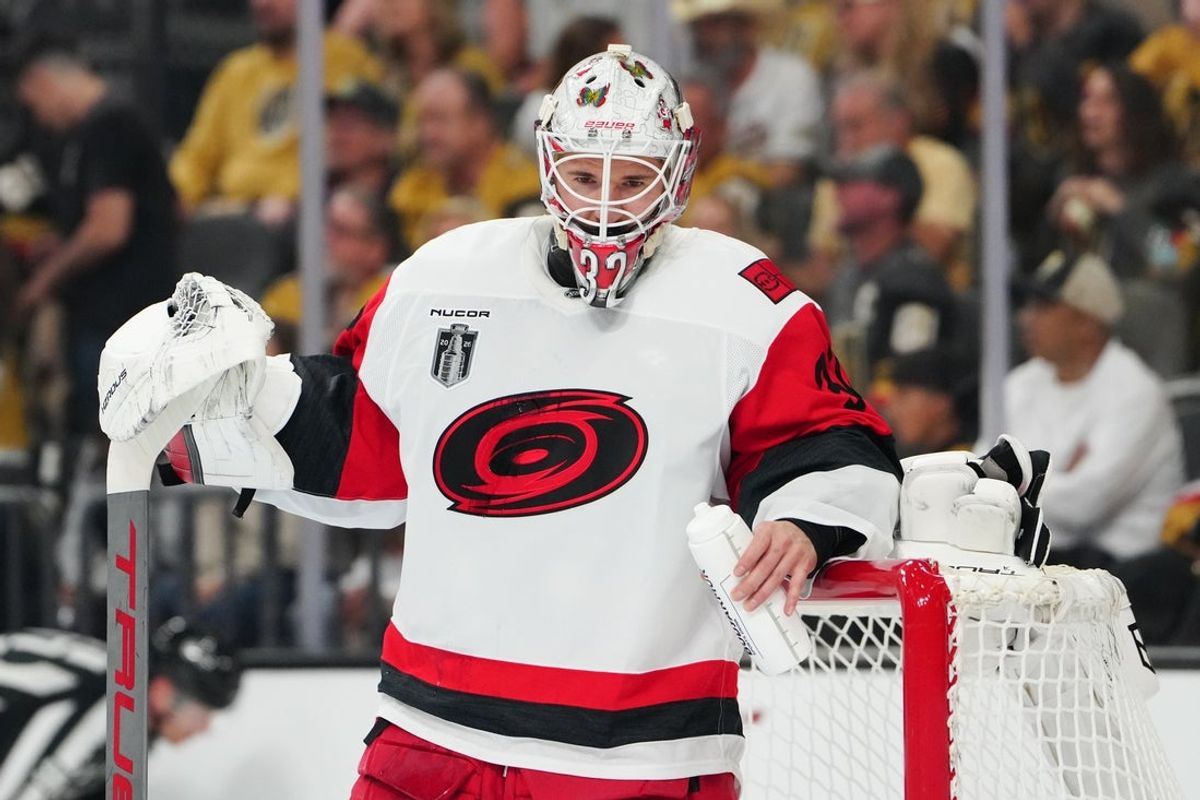 Jun 6, 2026; Las Vegas, Nevada, USA; Carolina Hurricanes goaltender Brandon Bussi (32) looks on during the third period against the Vegas Golden Knights in game three of the 2026 Stanley Cup Final at T-Mobile Arena. Mandatory Credit: Stephen R. Sylvanie-Imagn Images