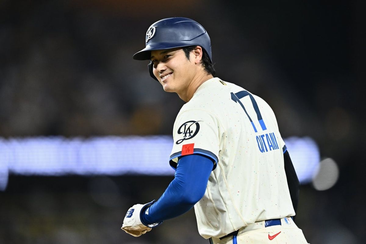 Jun 6, 2026; Los Angeles, California, USA; Los Angeles Dodgers designated hitter Shohei Ohtani (17) reacts after drawing a walk against the Los Angeles Angels during the eighth inning at Dodger Stadium. Mandatory Credit: William Liang-Imagn Images