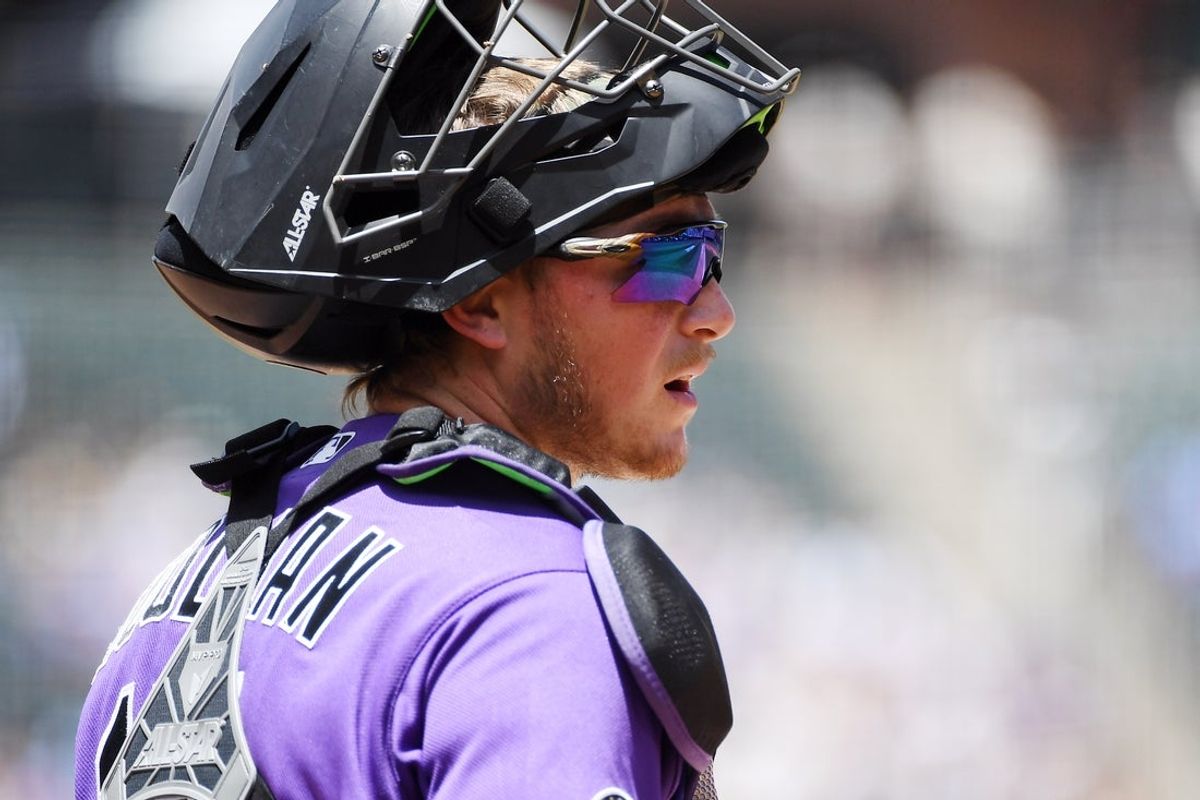 Jun 7, 2026; Denver, Colorado, USA; Colorado Rockies catcher Hunter Goodman (15) looks to the bench during the first inning against the Milwaukee Brewers at Coors Field. Mandatory Credit: Christopher Hanewinckel-Imagn Images