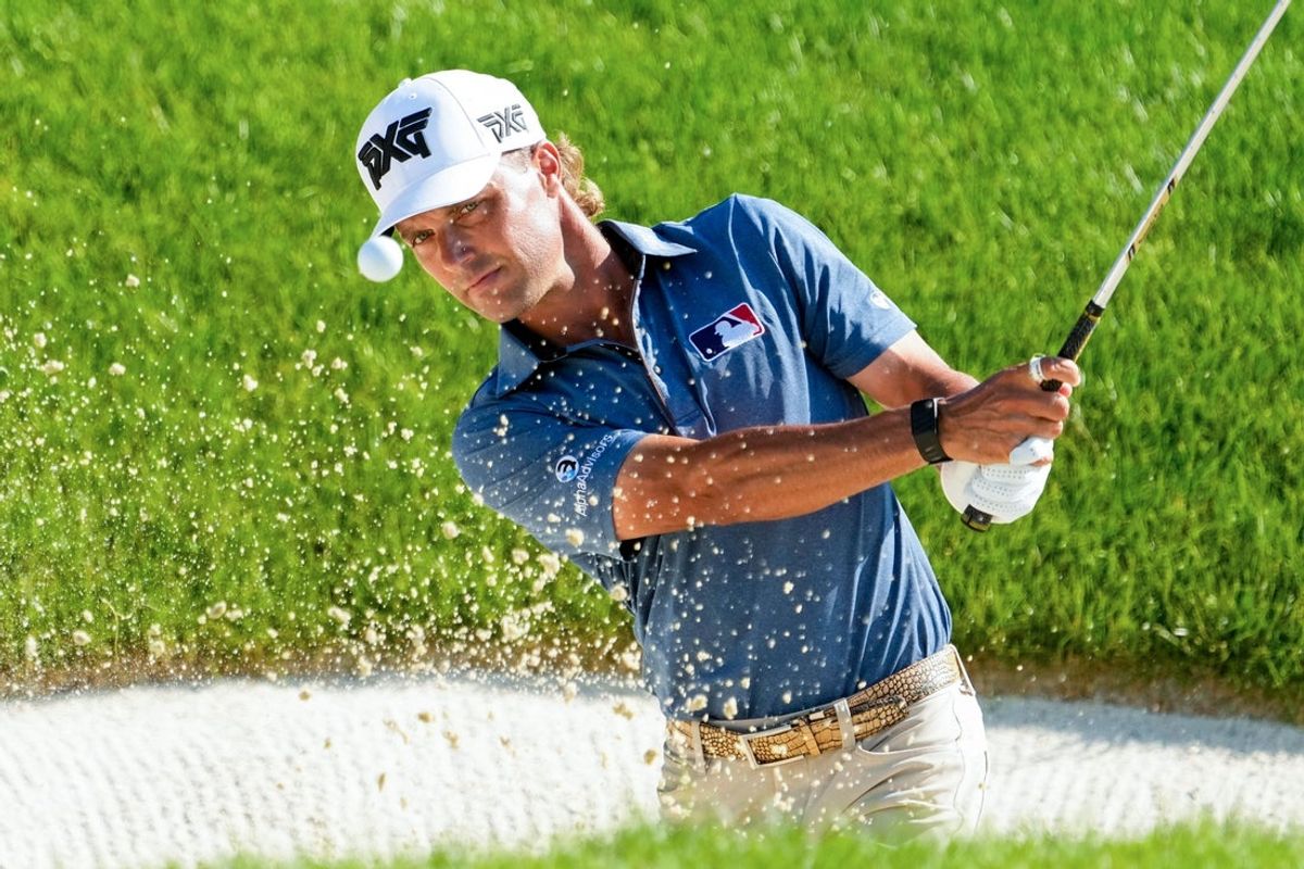 Eric Cole chips the ball on the 18th green during the final round of the Memorial Tournament at Muirfield Village Golf Club on June 7, 2026.
