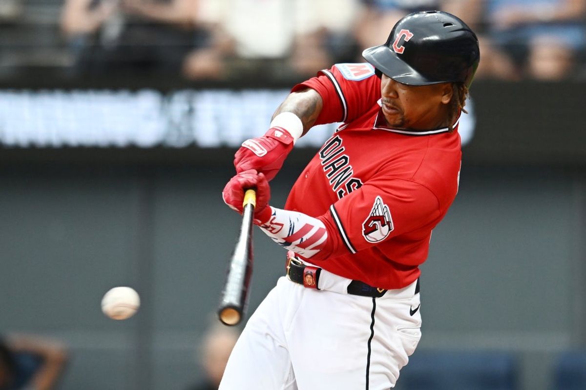 Jun 8, 2026; Cleveland, Ohio, USA; Cleveland Guardians third baseman Jose Ramirez (11) hits a single during the third inning against the New York Yankees at Progressive Field. Mandatory Credit: Ken Blaze-Imagn Images