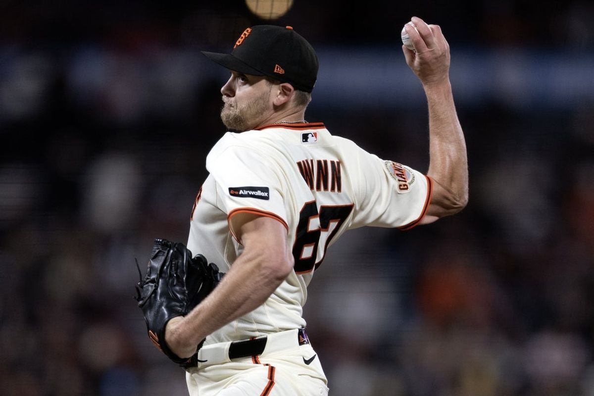 Jun 8, 2026; San Francisco, California, USA; San Francisco Giants pitcher Keaton Winn (67) delivers against the Washington Nationals during the ninth inning at Oracle Park. Mandatory Credit: D. Ross Cameron-Imagn Images