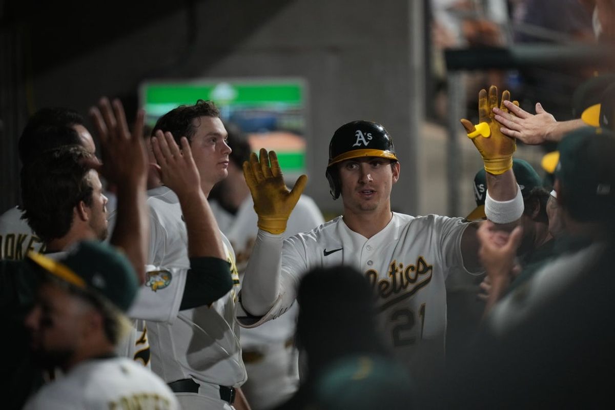 Jun 8, 2026; Summerlin, Nevada, USA;  Athletics left fielder Tyler Soderstrom (21) celebrates with teammates after hitting a home run against the Milwaukee Brewers during the seventh inning at the Las Vegas Ballpark. Mandatory Credit: Lucas Peltier-Imagn Images