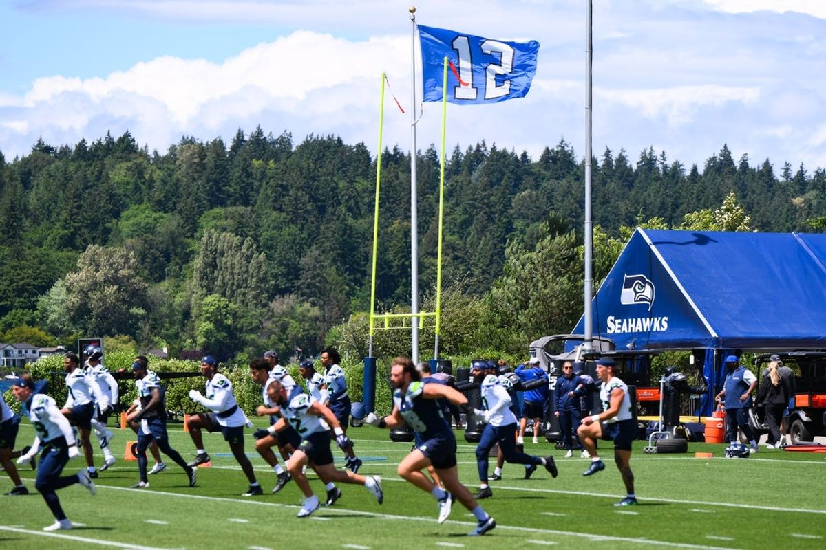 Jun 9, 2026; Renton, WA, USA; The Seattle Seahawks run drills during minicamp at Virginia Mason Athletic Center. Mandatory Credit: Steven Bisig-Imagn Images