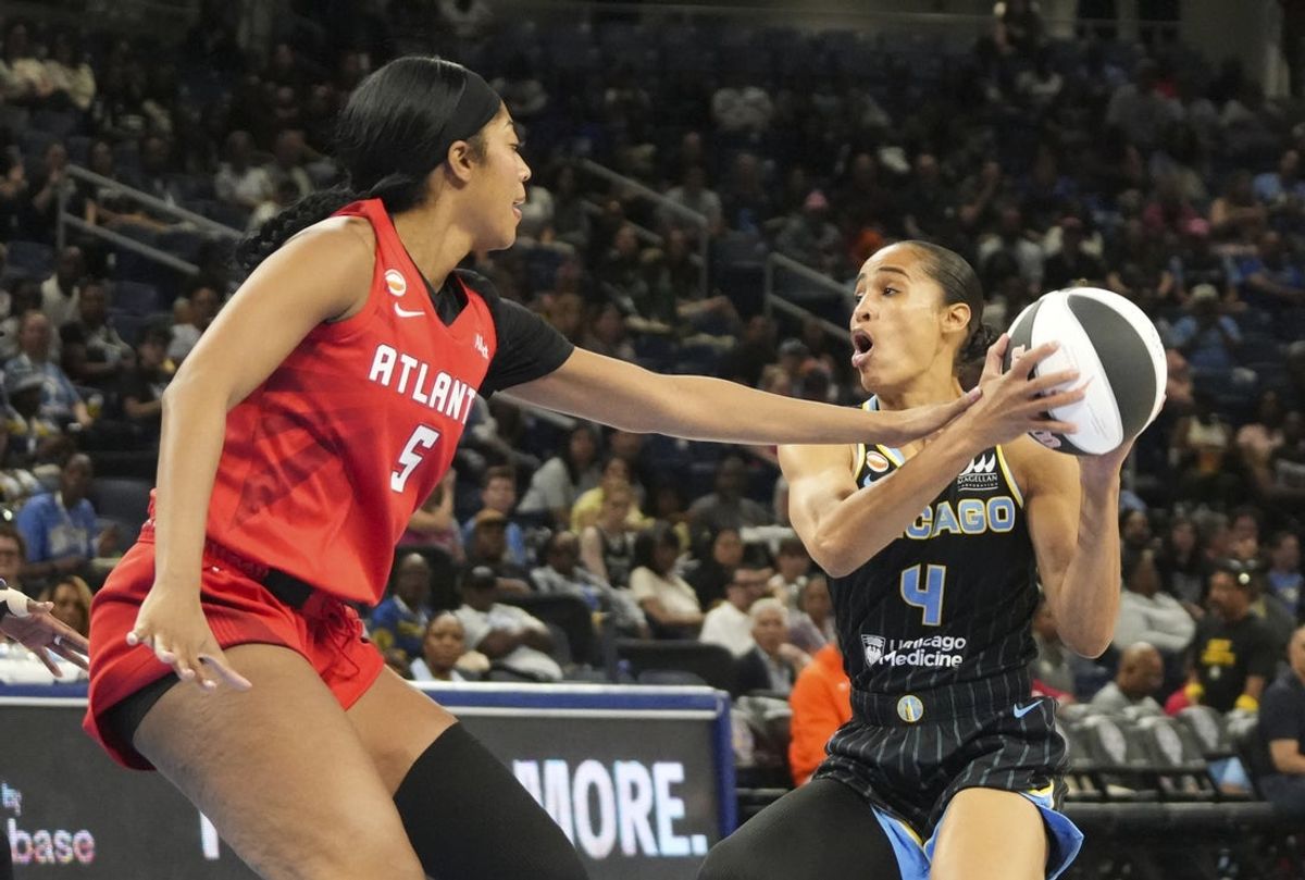 Jun 9, 2026; Chicago, Illinois, USA; Atlanta Dream forward Angel Reese (5) defends Chicago Sky guard Skylar Diggins (4) during the first half at Wintrust Arena. Mandatory Credit: David Banks-Imagn Images