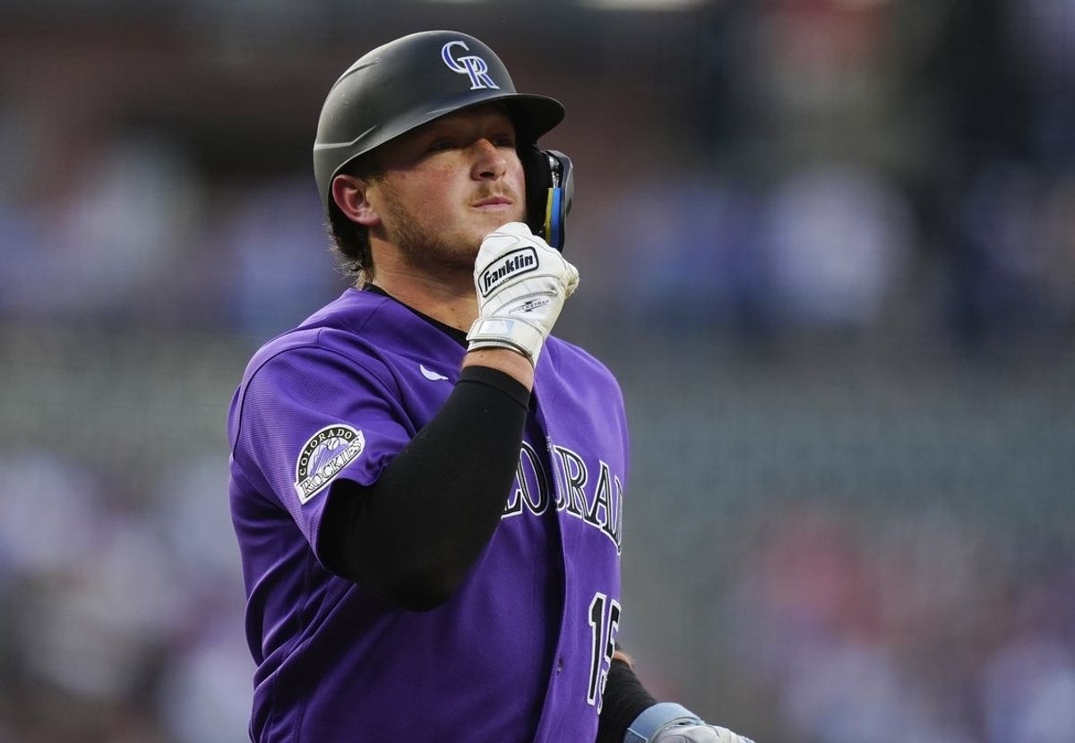 Jun 9, 2026; Denver, Colorado, USA; Colorado Rockies catcher Hunter Goodman (15) reacts to his two run home run in the first inning against the Chicago Cubs at Coors Field. Mandatory Credit: Ron Chenoy-Imagn Images