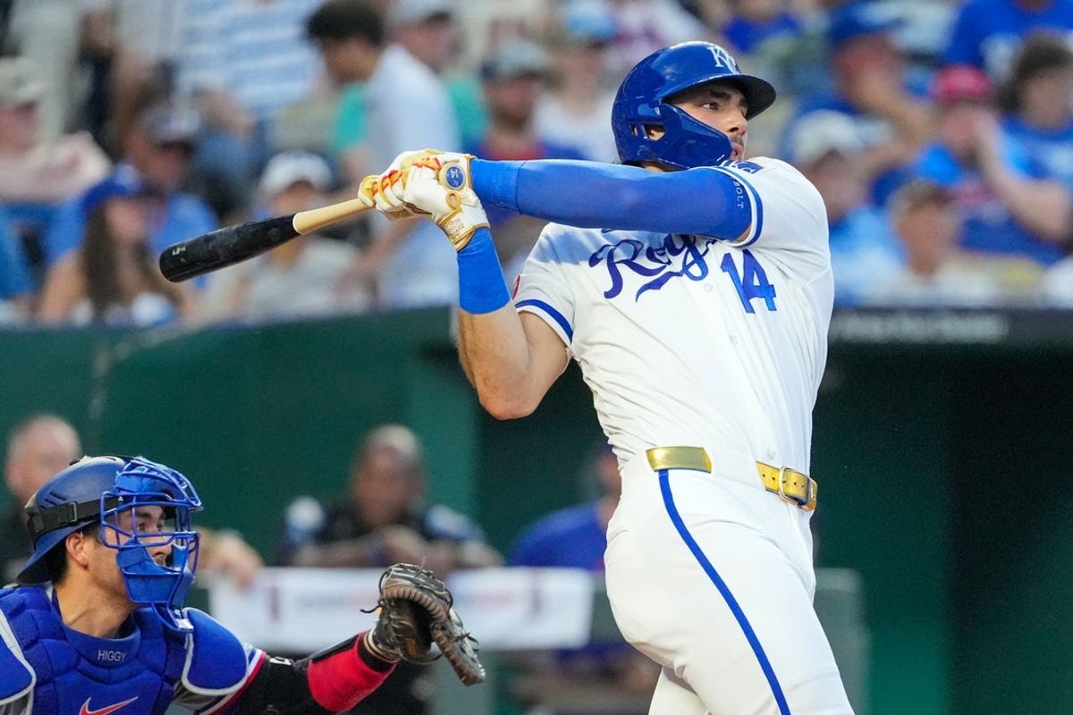 Jun 9, 2026; Kansas City, Missouri, USA; Kansas City Royals right fielder Jac Caglianone (14) hits a two run home run against the Texas Rangers during the sixth inning at Kauffman Stadium. Mandatory Credit: Denny Medley-Imagn Images