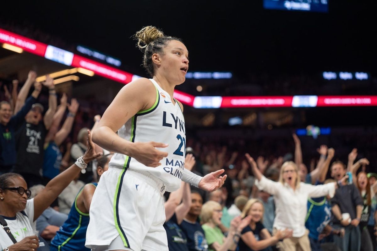 Jun 9, 2026; Minneapolis, Minnesota, USA; Minnesota Lynx guard Kayla McBride (21) reacts to her shot going in as fans cheer the basket against the Dallas Wings in the fourth quarter at Target Center. Mandatory Credit: Matt Blewett-Imagn Images