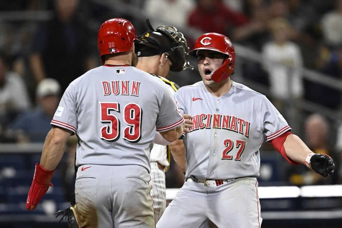 Jun 9, 2026; San Diego, California, USA; Cincinnati Reds first baseman Sal Stewart (27) is congratulated by center fielder Blake Dunn (59) after hitting a two-run home run during the 11th inning against the San Diego Padres at Petco Park. Mandatory Credit: Denis Poroy-Imagn Images