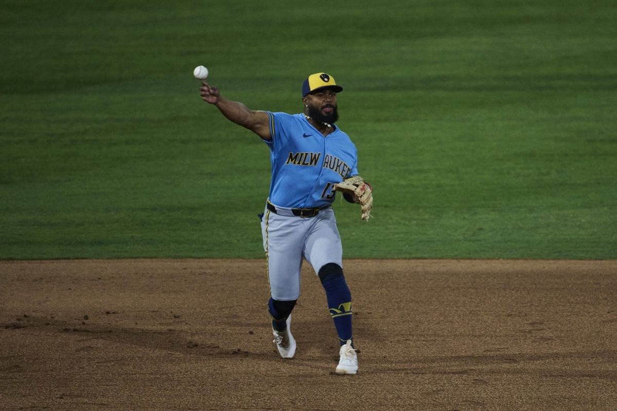 Jun 9, 2026; Summerlin, Nevada, USA; Milwaukee Brewers third baseman Luis Rengifo (13) throws to first during the sixth inning of the game against the Athletics at Las Vegas Ballpark. Mandatory Credit: Jeffery Bennett-Imagn Images
