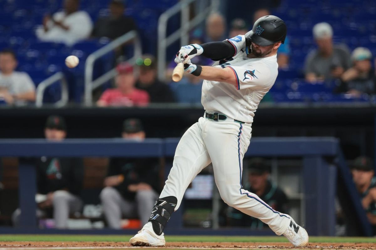 Jun 10, 2026; Miami, Florida, USA; Miami Marlins catcher Liam Hicks (34) hits a single against the Arizona Diamondbacks during the first inning at loanDepot Park. Mandatory Credit: Sam Navarro-Imagn Images