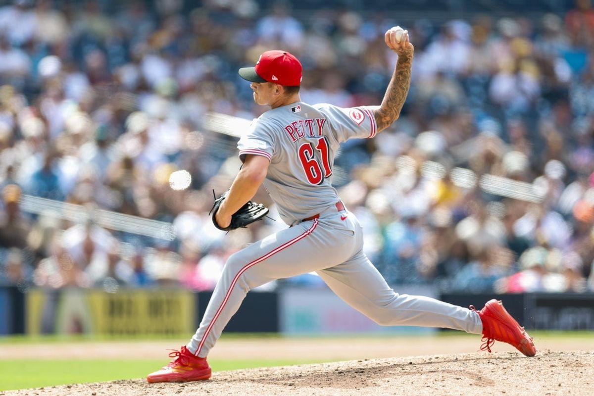 Jun 10, 2026; San Diego, California, USA; Cincinnati Reds relief pitcher Chase Petty (61) throws a pitch during the ninth inning against the San Diego Padres at Petco Park. Mandatory Credit: David Frerker-Imagn Images