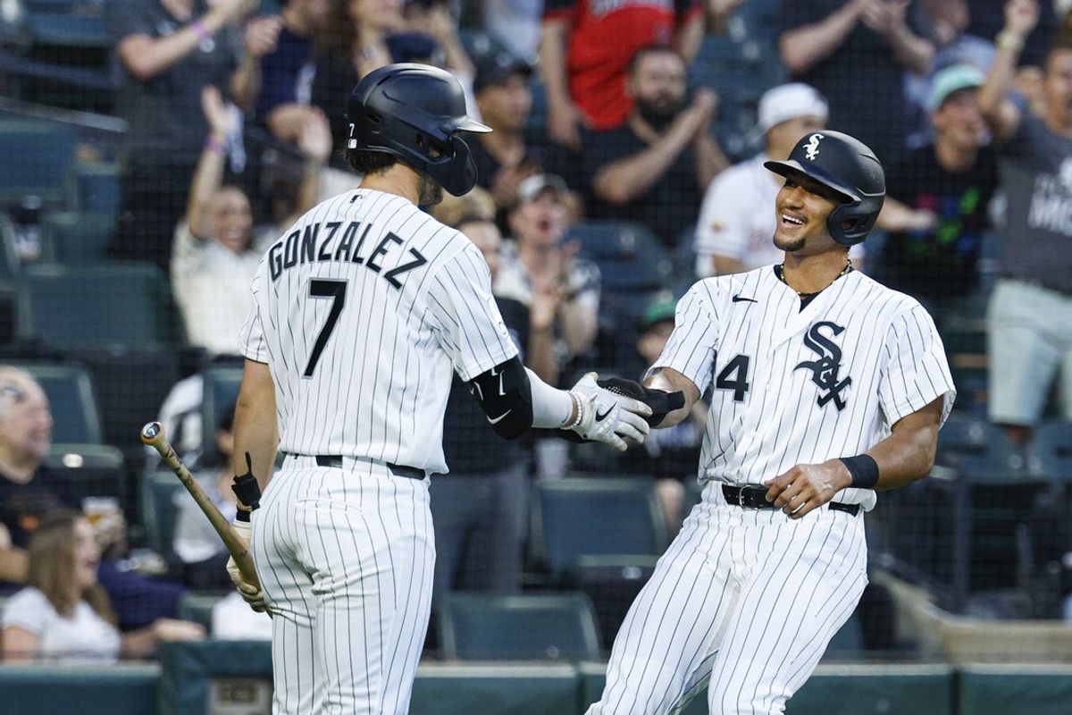 Jun 10, 2026; Chicago, Illinois, USA; Chicago White Sox right fielder Branden Montgomery (24) celebrates with first baseman Jacob Gonzalez (7) after scoring against the Atlanta Braves during the fourth inning at Rate Field. Mandatory Credit: Kamil Krzaczynski-Imagn Images