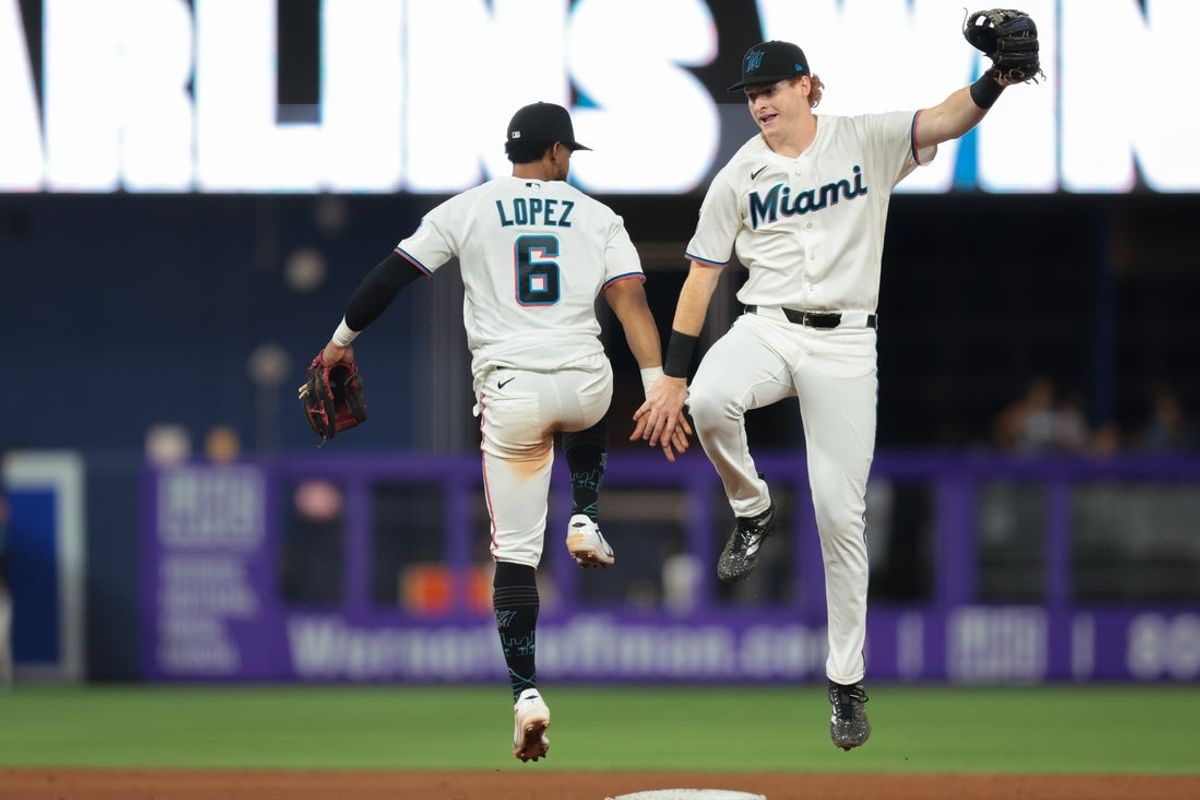 Jun 10, 2026; Miami, Florida, USA; Miami Marlins right fielder Owen Caissie (17) celebrates with shortstop Otto Lopez (6) after the game against the Arizona Diamondbacks at loanDepot Park. Mandatory Credit: Sam Navarro-Imagn Images