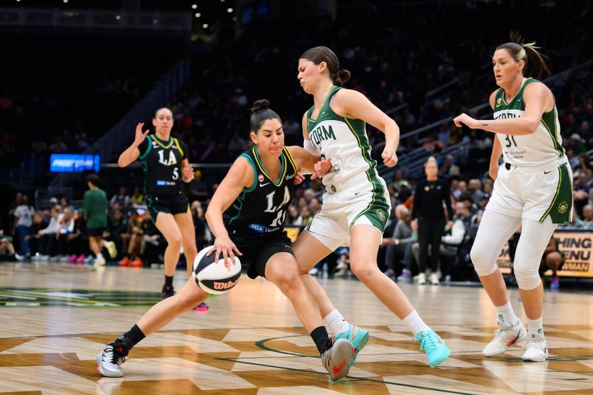 Jun 10, 2026; Seattle, Washington, USA; Seattle Storm guard Jade Melbourne (5) guards Los Angeles Sparks guard Kelsey Plum (10) during the first half at Climate Pledge Arena. Mandatory Credit: Steven Bisig-Imagn Images