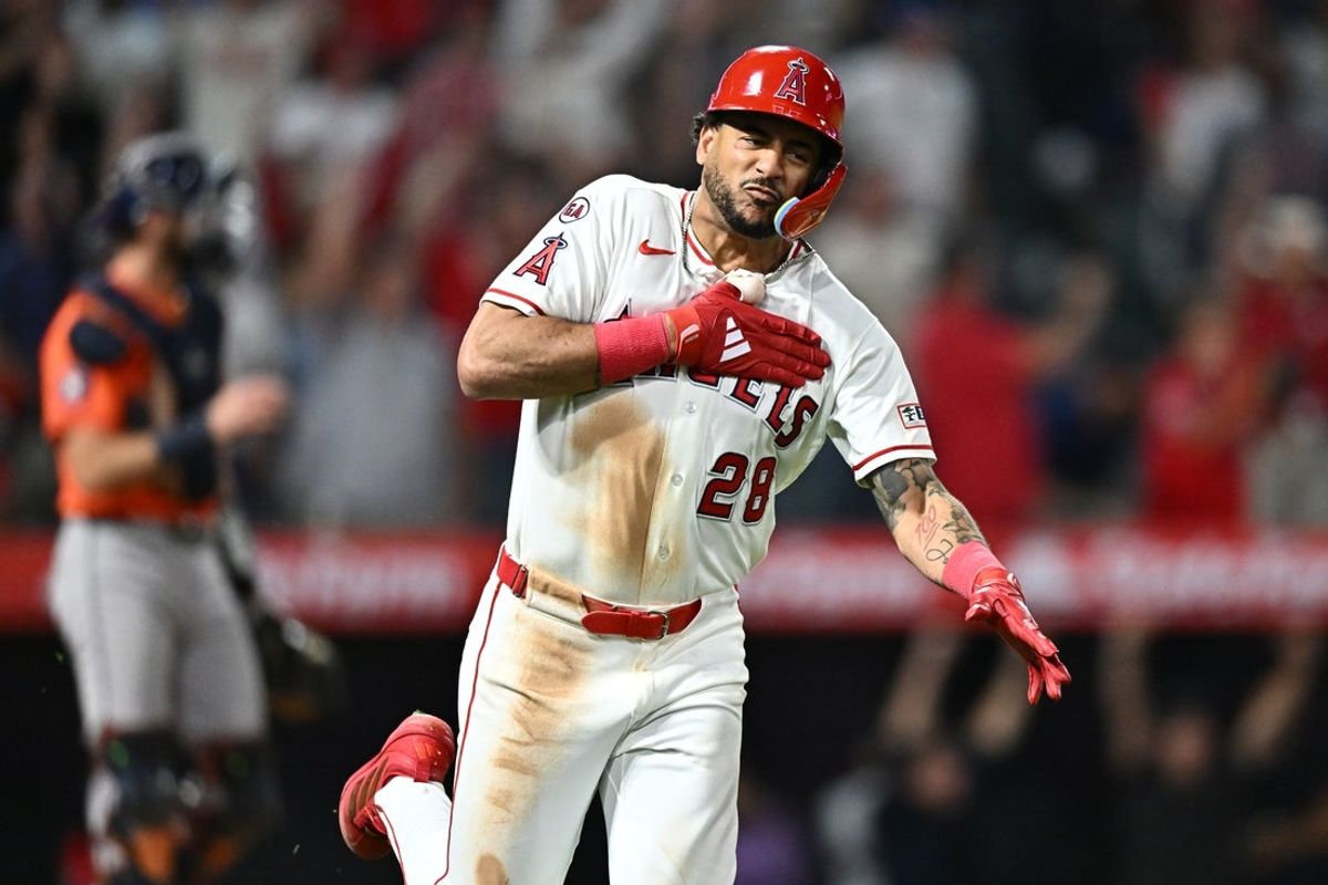 Jun 10, 2026; Anaheim, California, USA; Los Angeles Angels center fielder Jose Siri (28) reacts after hitting a walkoff single during the tenth inning against the Houston Astros at Angel Stadium. Mandatory Credit: William Liang-Imagn Images
