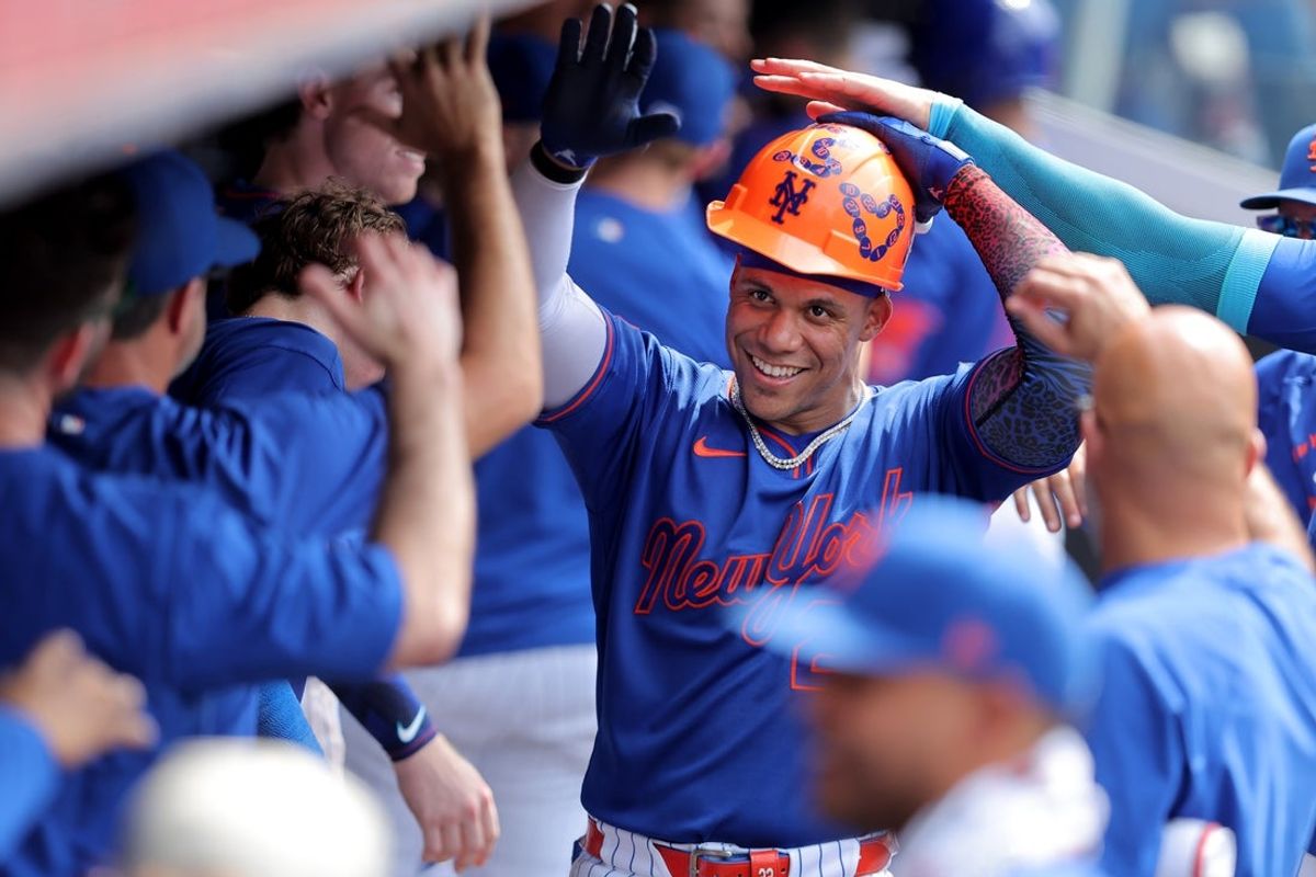 Jun 11, 2026; New York City, New York, USA; New York Mets designated hitter Juan Soto (22) celebrates his solo home run against the St. Louis Cardinals with teammates in the dugout during the seventh inning at Citi Field. Mandatory Credit: Brad Penner-Imagn Images