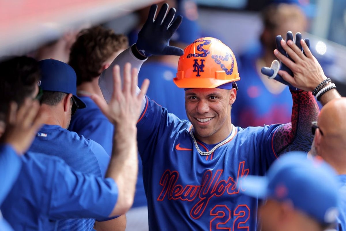 Jun 11, 2026; New York City, New York, USA; New York Mets designated hitter Juan Soto (22) celebrates his solo home run against the St. Louis Cardinals with teammates in the dugout during the seventh inning at Citi Field. Mandatory Credit: Brad Penner-Imagn Images