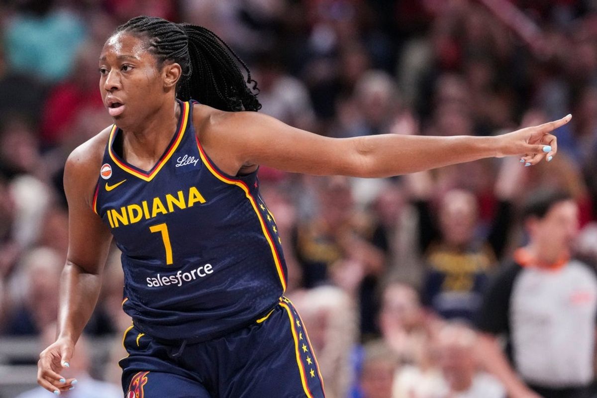 Indiana Fever center Aliyah Boston (7) celebrates scoring Thursday, June 11, 2026, during the first half of a game at Gainbridge Fieldhouse in Indianapolis.
