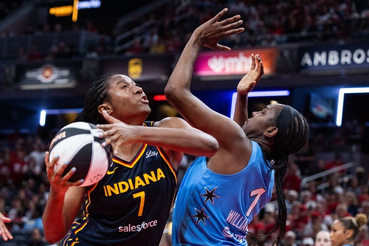 Jun 11, 2026; Indianapolis, Indiana, USA; Indiana Fever center-forward Aliyah Boston (7) shoots the ball while Chicago Sky center-forward Elizabeth Williams (1) defends in the second half at Gainbridge Fieldhouse. Mandatory Credit: Trevor Ruszkowski-Imagn Images