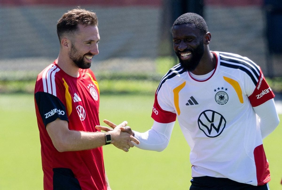 June 12, 2026; Winston-Salem, North Carolina, U.S.; Germany's Antonio Rudiger shakes hands with athletic coach Bram Geers during training.  Mandatory Credit: Scott Kinser-Imagn Images