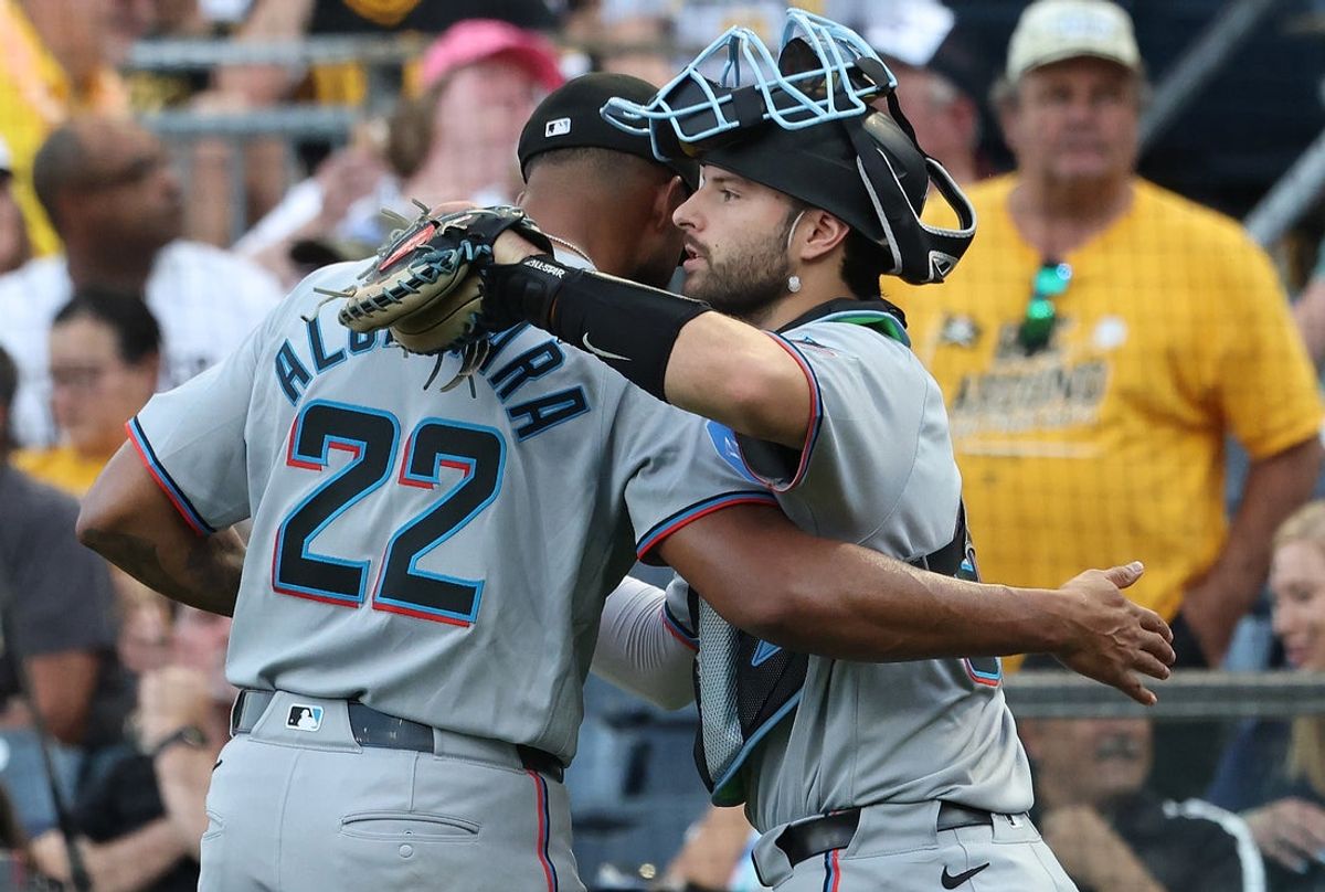 Jun 12, 2026; Pittsburgh, Pennsylvania, USA; Miami Marlins starting pitcher Sandy Alcantara (22) celebrates with catcher Joe Mack (right) after Alcantara stuck out Pittsburgh Pirates left fielder Tyler Callihan (not pictured) to record his 1000th career MLB strikeout during the fourth inning at PNC Park. Mandatory Credit: Charles LeClaire-Imagn Images