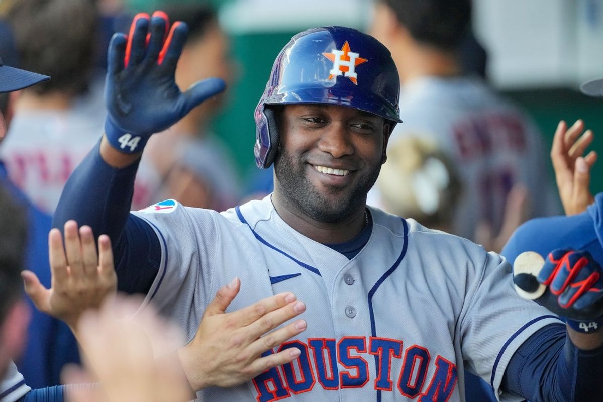 Jun 12, 2026; Kansas City, Missouri, USA; Houston Astros designated hitter Yordan Alvarez (44) celebrates in the dugout after hitting a grand slam against the Kansas City Royals during the first inning at Kauffman Stadium. Mandatory Credit: Denny Medley-Imagn Images