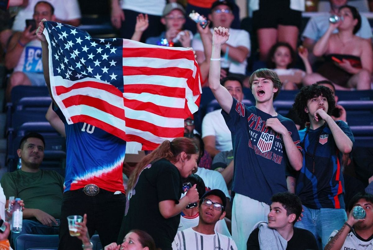 June 12, 2026; Flushing, New York, U.S.; U.S. fans celebrate after Folarin Balogun scores their second goal. Mandatory Credit: Caean Couto-Imagn Images