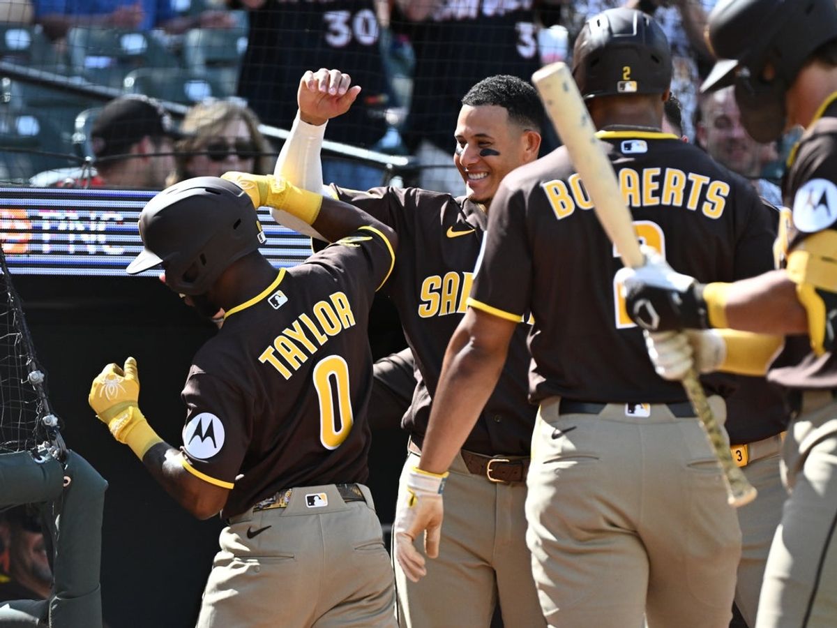 Jun 13, 2026; Baltimore, Maryland, USA;  San Diego Padres left fielder Samad Taylor (0) celebrates with teammates after hitting a two run home run during the first inning at Oriole Park at Camden Yards. Mandatory Credit: James A. Pittman-Imagn Images