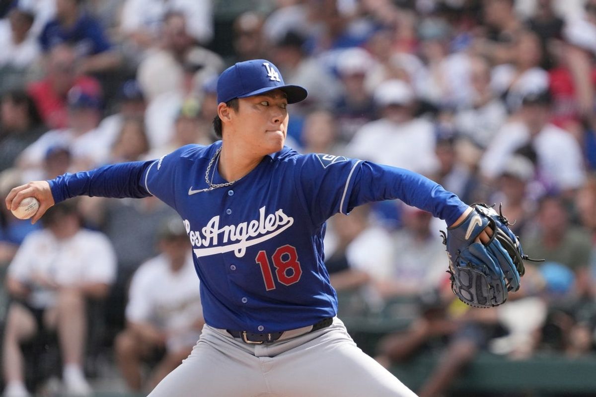 Jun 13, 2026; Chicago, Illinois, USA; Los Angeles Dodgers pitcher Yoshinobu Yamamoto (18) throws the ball against the Chicago White Sox during the fifth inning at Rate Field. Mandatory Credit: David Banks-Imagn Images