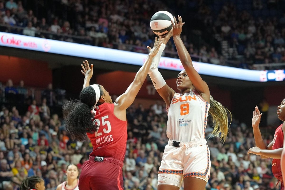 Jun 13, 2026; Uncasville, Connecticut, USA; Connecticut Sun forward Aaliyah Edwards (8) shoots a jump shot over Indiana Fever forward Monique Billings (25) during the first half at Mohegan Sun Arena. Mandatory Credit: Gregory Fisher-Imagn Images