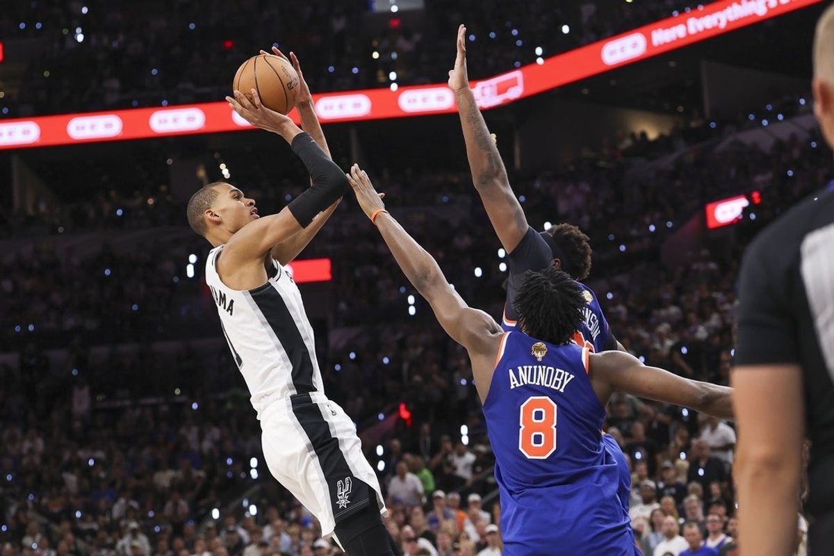 Jun 13, 2026; San Antonio, Texas, USA; San Antonio Spurs forward Victor Wembanyama (1) shoots the ball over New York Knicks forward Og Anunoby (8) during the third quarter during game five of the 2026 NBA Finals at Frost Bank Center. Mandatory Credit: Geoff Burke-Imagn Images