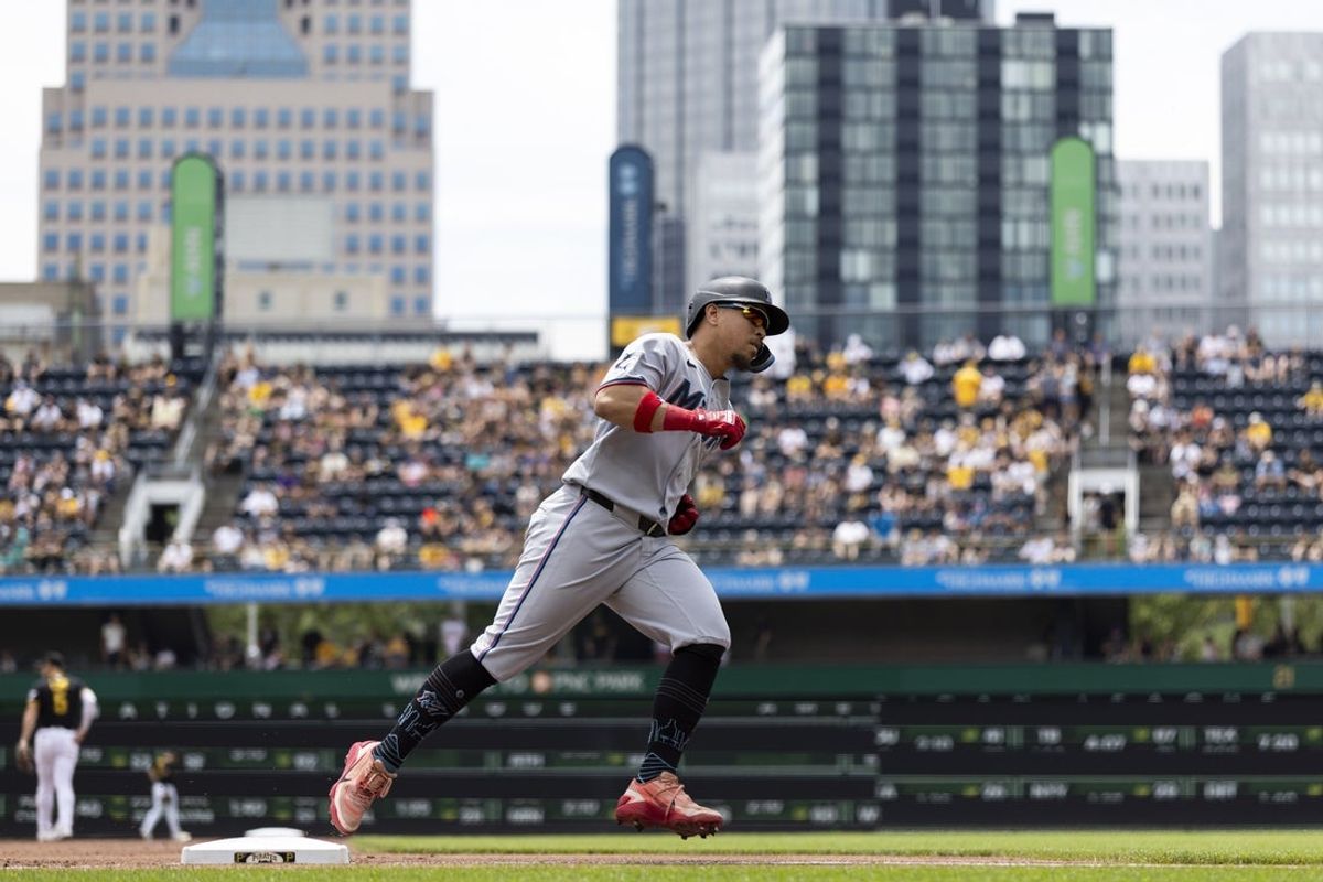 Jun 14, 2026; Pittsburgh, Pennsylvania, USA;  Miami Marlins left fielder Heriberto Hernández (13) rounds third base for his home run against the Pittsburgh Pirates during the second inning at PNC Park. Mandatory Credit: Scott Galvin-Imagn Images