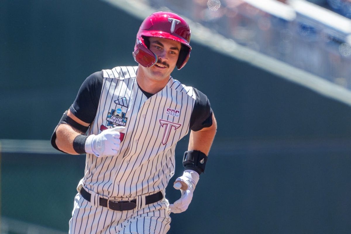 Jun 14, 2026; Omaha, NE, USA; Troy Trojans second baseman Sean Darnell (37) rounds the bases after hitting a two-run home run against the Mississippi Rebels during the second inning at Charles Schwab Field. Mandatory Credit: Dylan Widger-Imagn Images