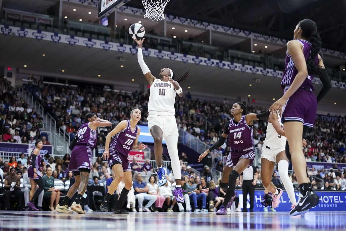 Jun 14, 2026; Toronto, Ontario, CAN; Atlanta Dream guard Rhyne Howard (10) drives to the basket against the Toronto Tempo during the first half at Coca-Cola Coliseum. Mandatory Credit: Kevin Sousa-Imagn Images