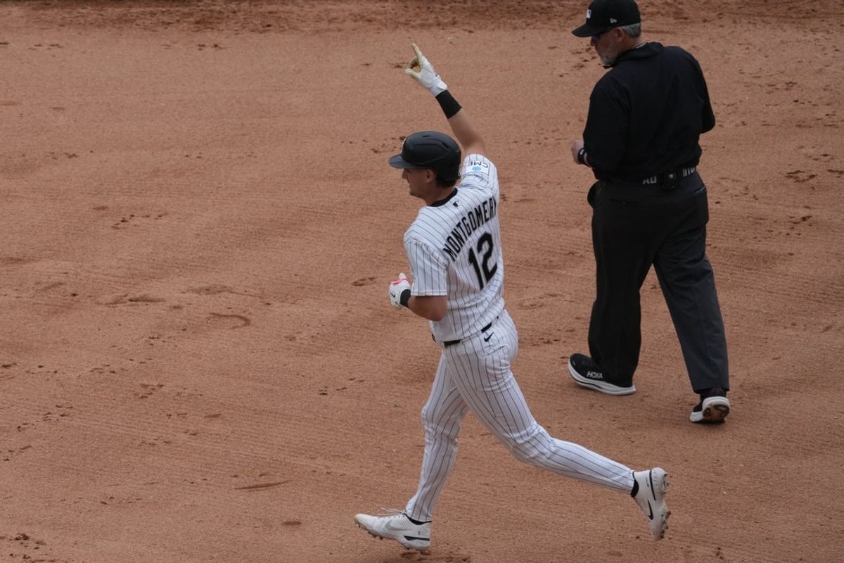 Jun 14, 2026; Chicago, Illinois, USA; Chicago White Sox shortstop Colson Montgomery (12) gestures after hitting a two-run homerun against the Los Angeles Dodgers during the sixth inning at Rate Field. Mandatory Credit: David Banks-Imagn Images