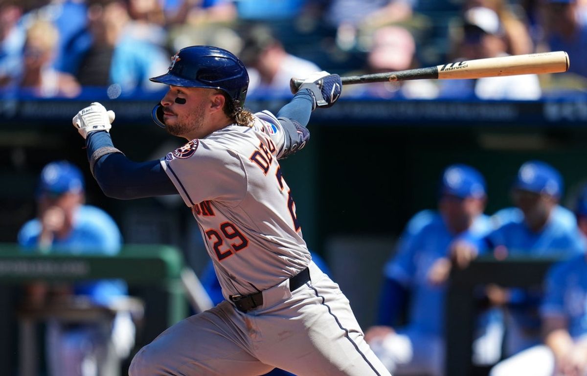 Jun 14, 2026; Kansas City, Missouri, USA; Houston Astros third baseman Raynel Delgado (29) hits a single for his first MLB hit during the eighth inning against the Kansas City Royals at Kauffman Stadium. Mandatory Credit: Jay Biggerstaff-Imagn Images