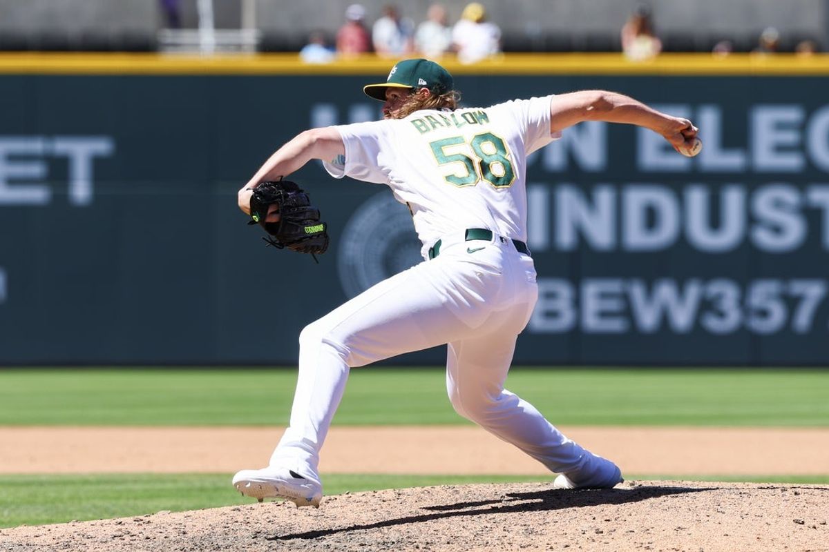 Jun 14, 2026; Summerlin, Nevada, USA;  Athletics pitcher Scott Barlow (58) pitches the ball in the eighth inning against the Colorado Rockies at Las Vegas Ballpark. Mandatory Credit: Boz Bloom-Imagn Images