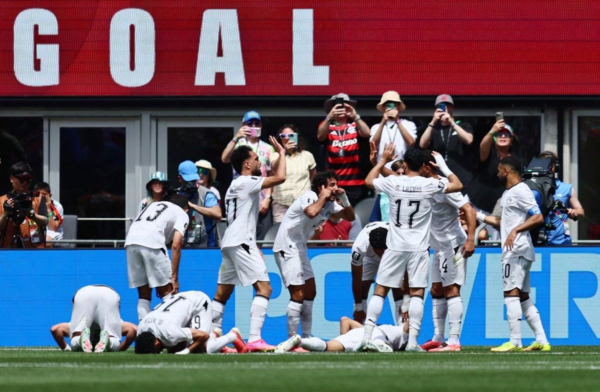Emam Ashour celebrates after scoring Egypt's first goal against Belgium at Seattle Stadium on June 15, 2026.