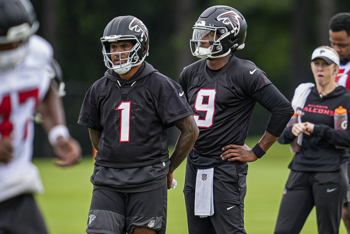 Jun 16, 2026; Atlanta, GA, USA; Atlanta Falcons quarterbacks Tua Tagovailoa (1) and  Michael Penix Jr. (9) on the field during Minicamp. Mandatory Credit: Dale Zanine-Imagn Images