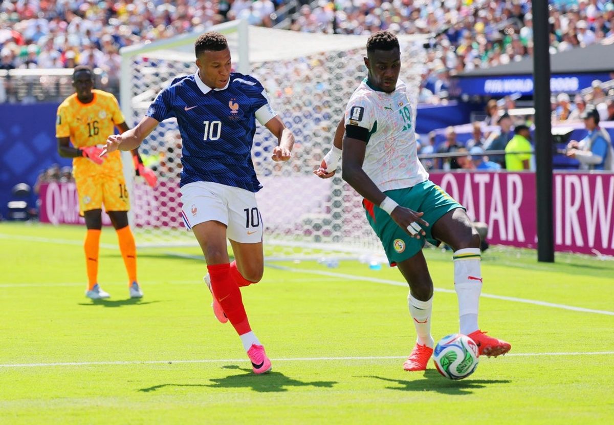 June 16, 2026; East Rutherford, New Jersey, U.S.; France's Kylian Mbappe in action with Senegal's Moussa Niakhate.  Mandatory Credit: Caean Couto-Imagn Images