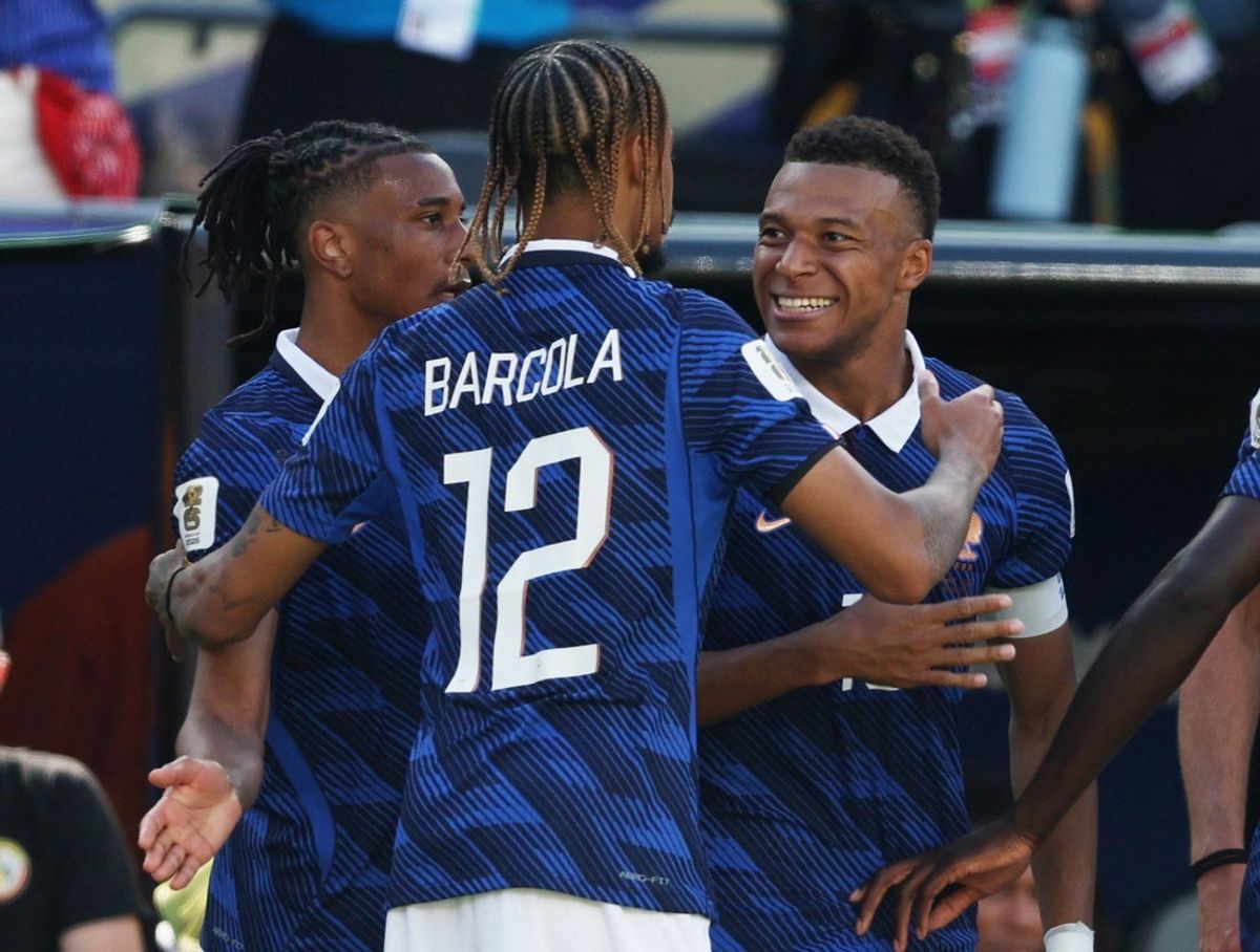 June 16, 2026; East Rutherford, New Jersey, U.S.; France's Kylian Mbappe celebrates scoring their third goal with Michael Olise and Bradley Barcola.  Mandatory Credit: Vincent Carchietta-Imagn Images