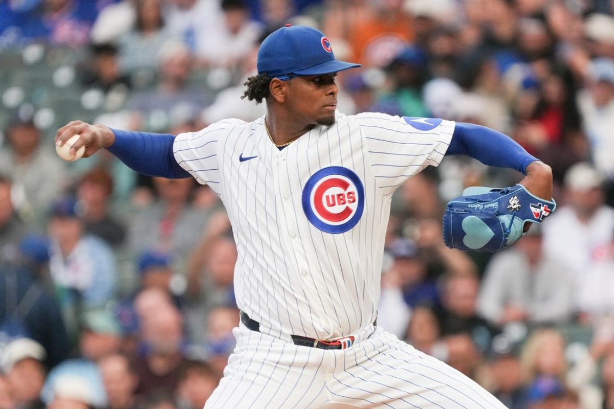Jun 16, 2026; Chicago, Illinois, USA; Chicago Cubs pitcher Edward Cabrera (30) throws the ball against the Colorado Rockies during the first inning at Wrigley Field. Mandatory Credit: David Banks-Imagn Images