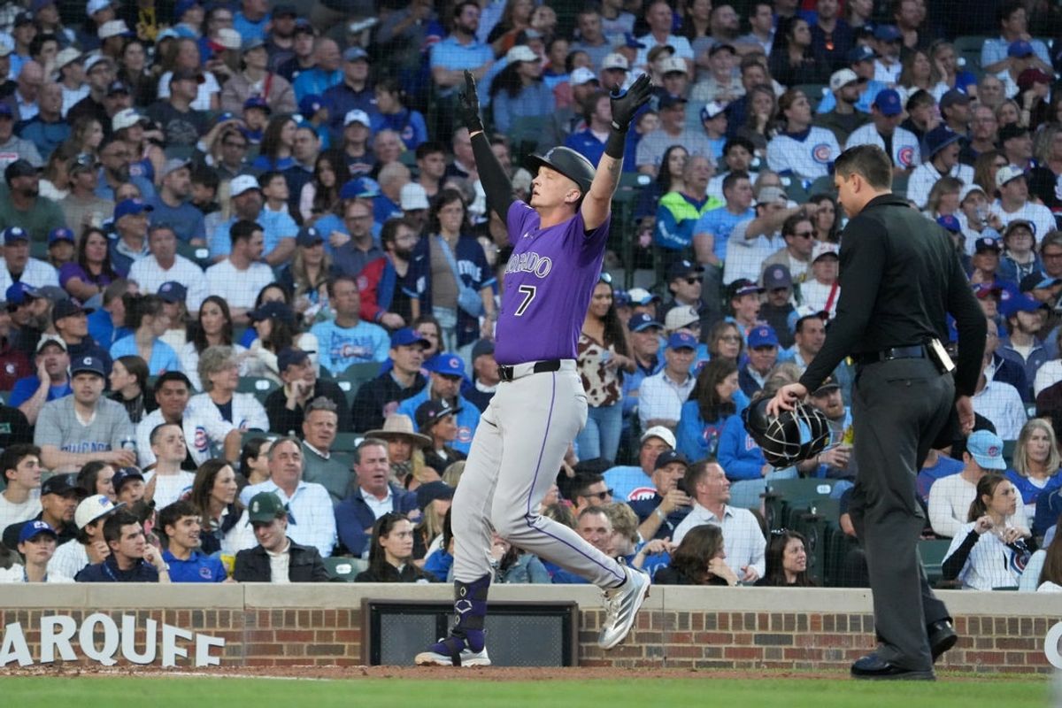 Jun 16, 2026; Chicago, Illinois, USA; Colorado Rockies first baseman TJ Rumfield (7) gestures after hitting a home run against the Chicago Cubs during the fourth inning at Wrigley Field. Mandatory Credit: David Banks-Imagn Images
