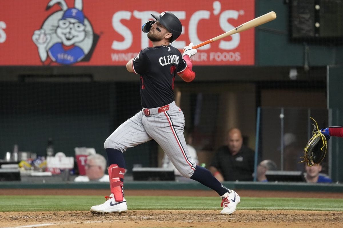 Jun 16, 2026; Arlington, Texas, USA; Minnesota Twins right fielder Kody Clemens (2) doubles against the Texas Rangers during the eighth inning at Globe Life Field. Mandatory Credit: Jim Cowsert-Imagn Images