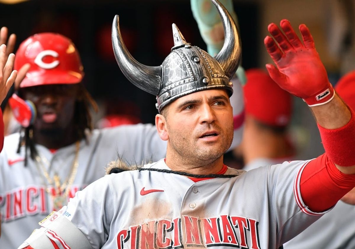 Jul 8, 2023; Milwaukee, Wisconsin, USA; Cincinnati Reds first baseman Joey Votto (19) celebrates his home run in the dugout against the Milwaukee Brewers in the fourth inning at American Family Field.